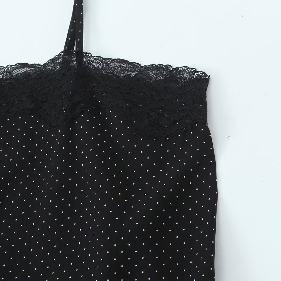 Spicy girl's asymmetrical suspender top with polka dots