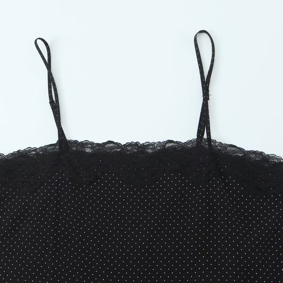 Spicy girl's asymmetrical suspender top with polka dots
