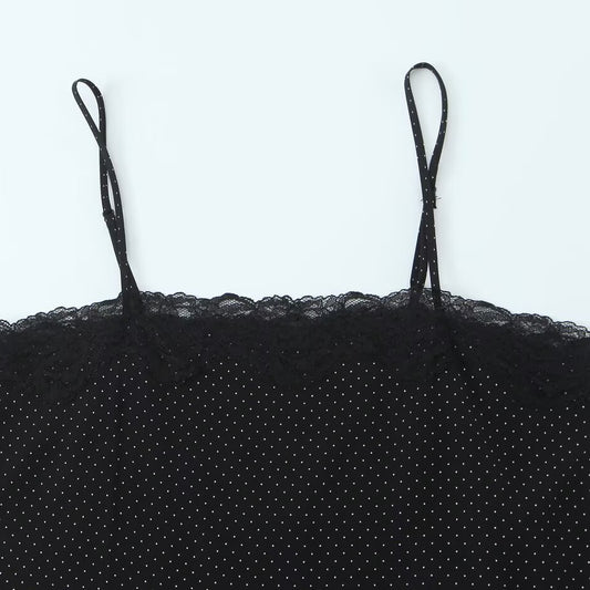 Spicy girl's asymmetrical suspender top with polka dots